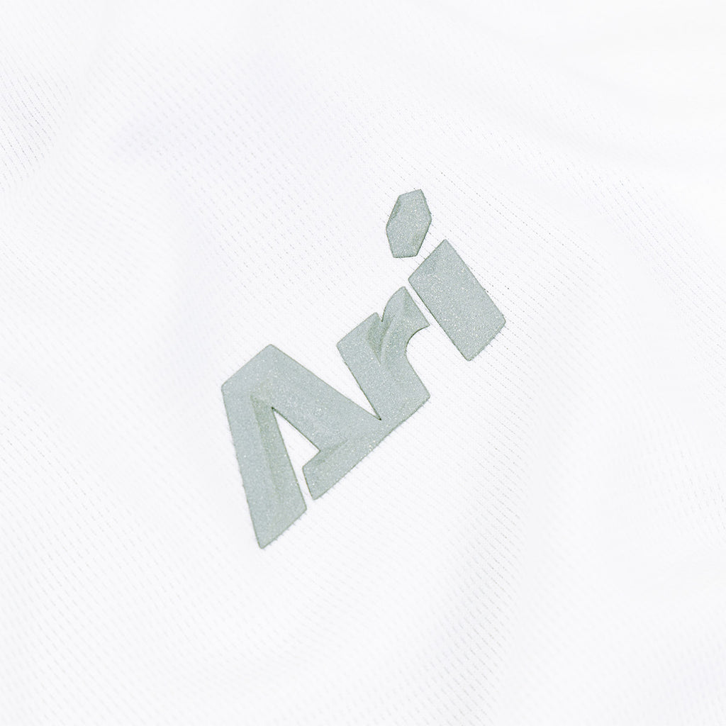 ARI WOMEN ADEPT GOLF POLO - WHITE/BLACK/SILVER