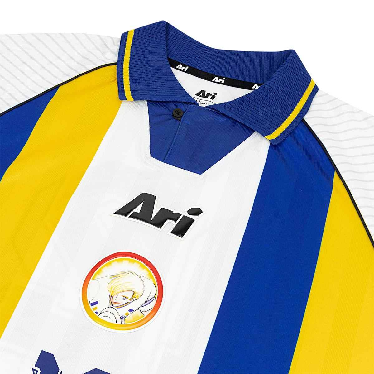 ARI X CAPTAIN TSUBASA WORLD YOUTH LEVIN RETRO JERSEY - WHITE/BLUE/YELLOW