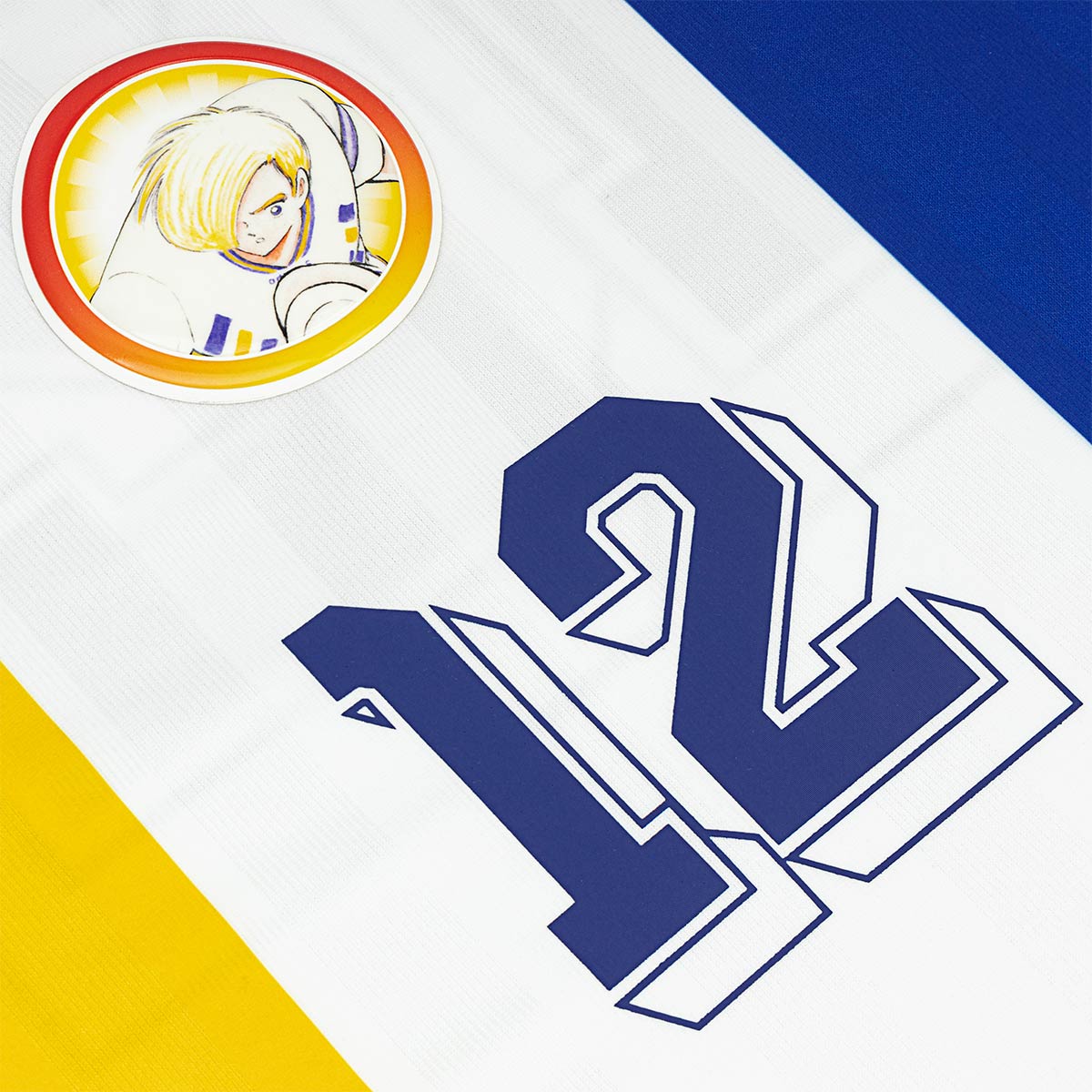 ARI X CAPTAIN TSUBASA WORLD YOUTH LEVIN RETRO JERSEY - WHITE/BLUE/YELLOW