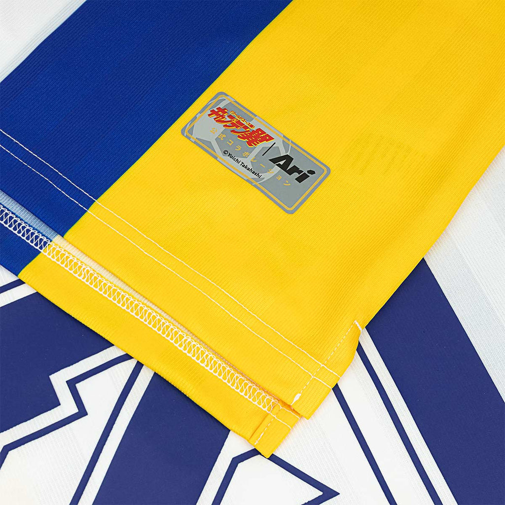 ARI X CAPTAIN TSUBASA WORLD YOUTH LEVIN RETRO JERSEY - WHITE/BLUE/YELLOW
