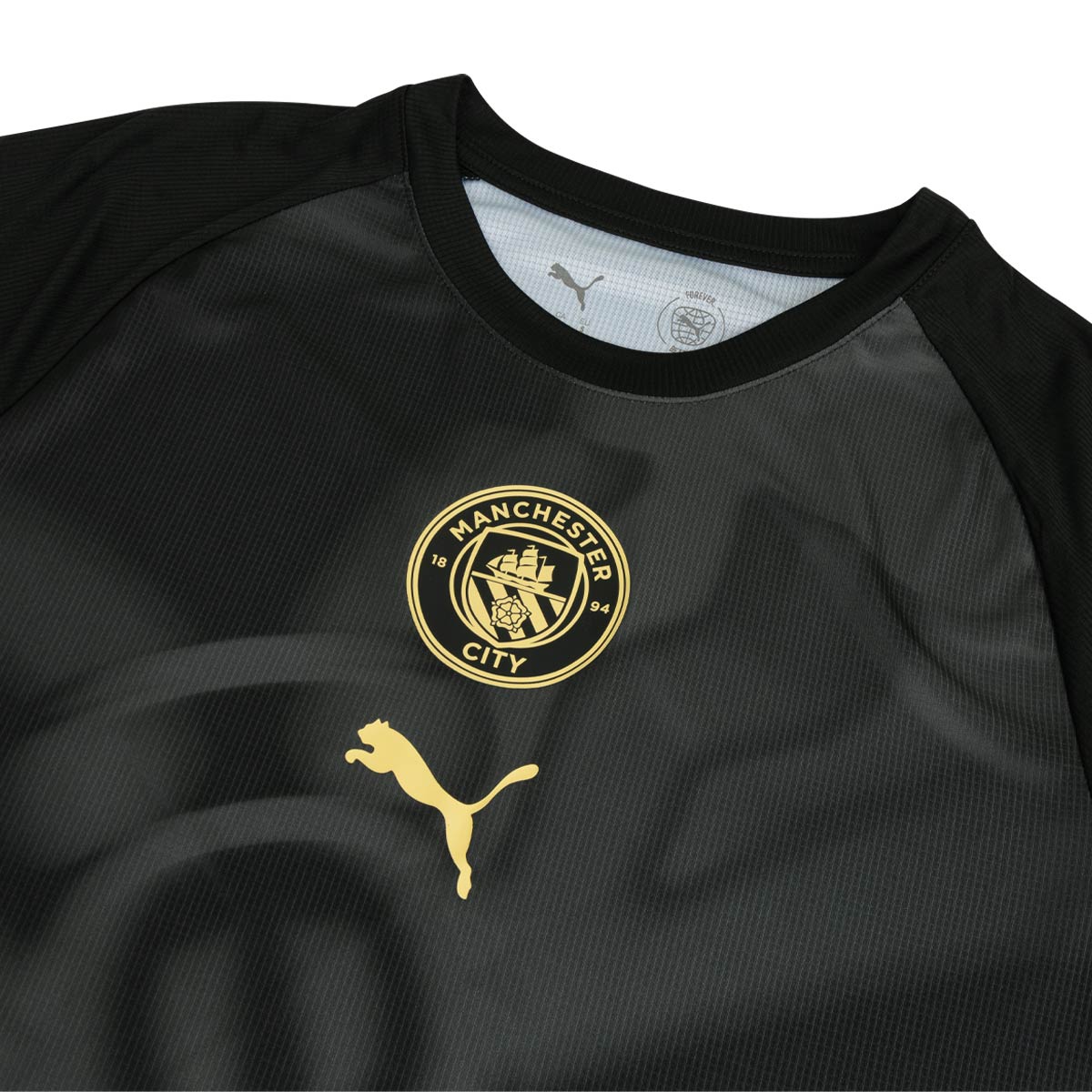 PUMA MANCHESTER CITY 2026/2027 PRE MATCH JERSEY - PUMA BLACK/ARCHIVE GOLD
