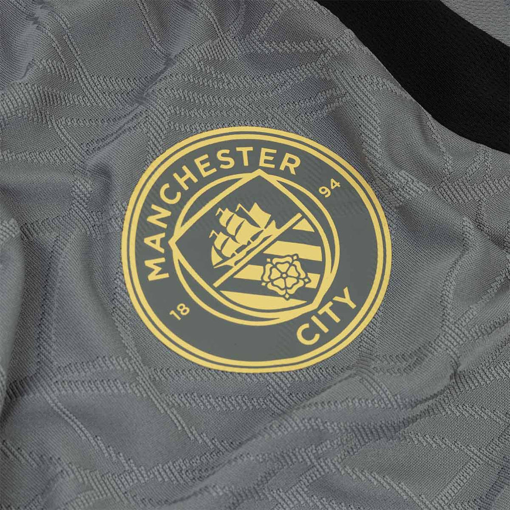 PUMA MANCHESTER CITY 2026/2027 TRAINING JERSEY - CAST IRON/FLAXEN