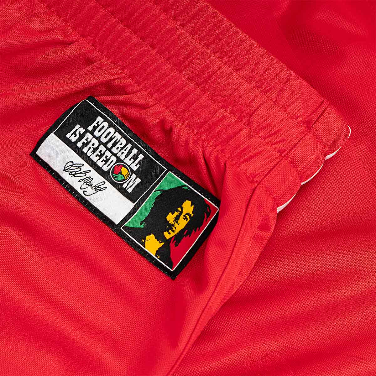 ADIDAS JAMAICA X BOB MARLEY OG SHORTS - PURE RUBY