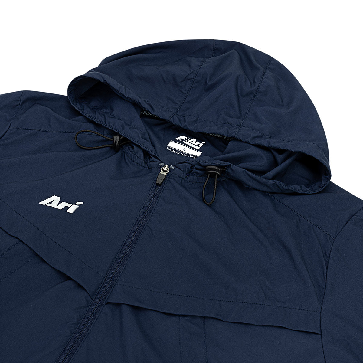 ARI ESSENTIAL WINDBREAKER JACKET - NAVY/SILVER/WHITE