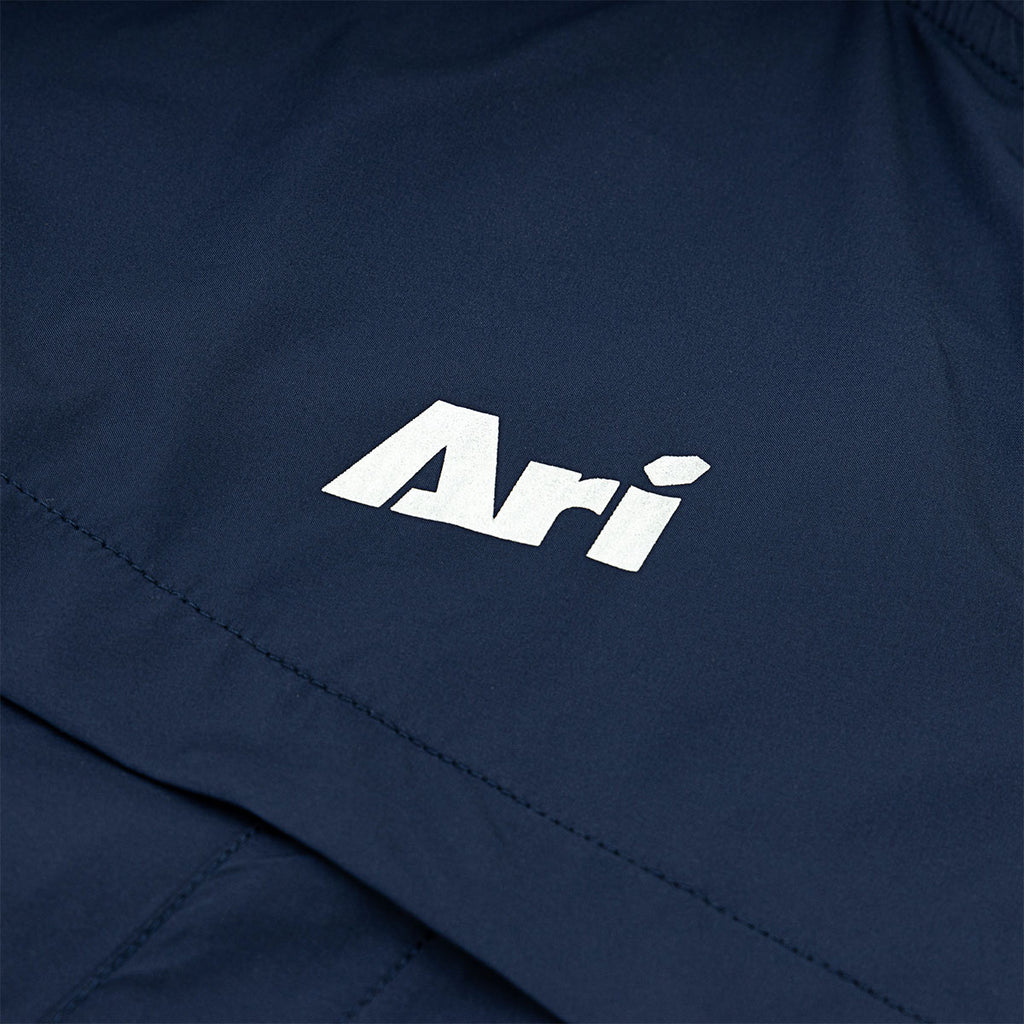 ARI ESSENTIAL WINDBREAKER JACKET - NAVY/SILVER/WHITE