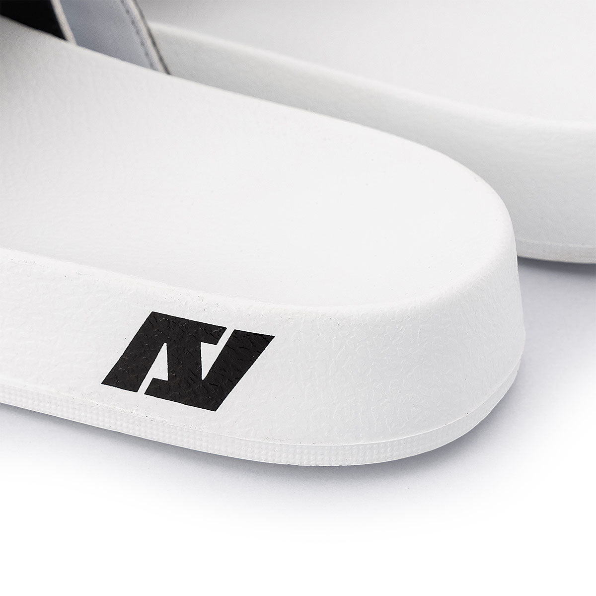 ARI SLIDE SANDALS - WHITE/BLACK
