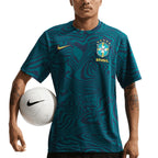 NIKE BRAZIL 2026 PRIMARY STMT SS TOP - GEODE TEAL/MIDWEST GOLD