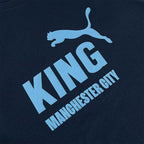 PUMA MANCHESTER CITY 2025/2026 KING LOGO TEE - DEEP NAVY/TEAM LIGHT BLUE