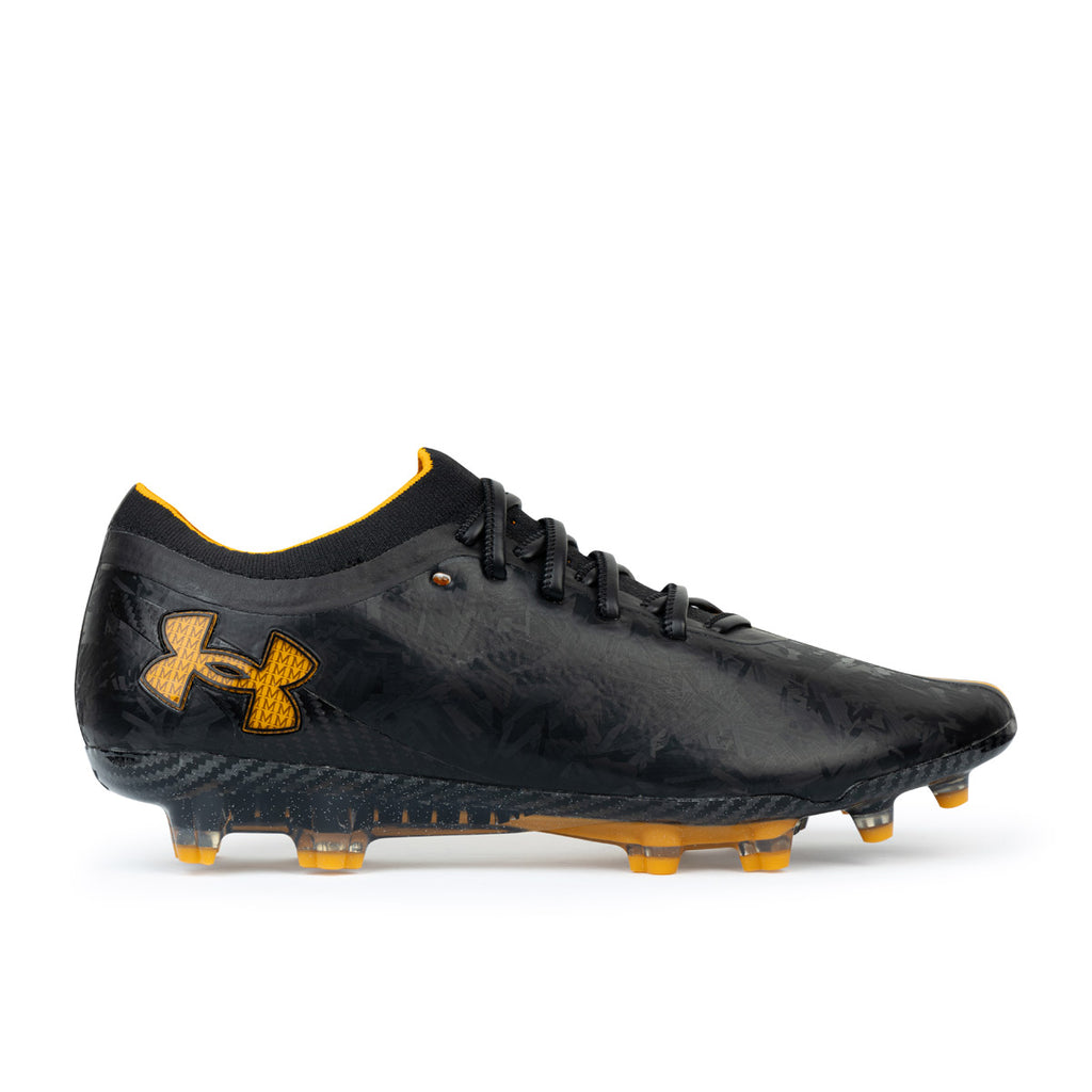 UNDER ARMOUR MAGNETICO 5.0 FG MANSORY - CASTLEROCK/BLACK/SQUAD ORANGE