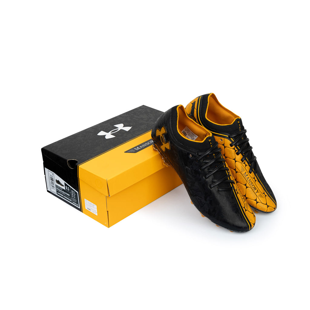 UNDER ARMOUR MAGNETICO 5.0 FG MANSORY - CASTLEROCK/BLACK/SQUAD ORANGE