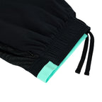 UNDER ARMOUR CHALLENGER SHORTS MANSORY - BLACK/TROPICAL TIDE